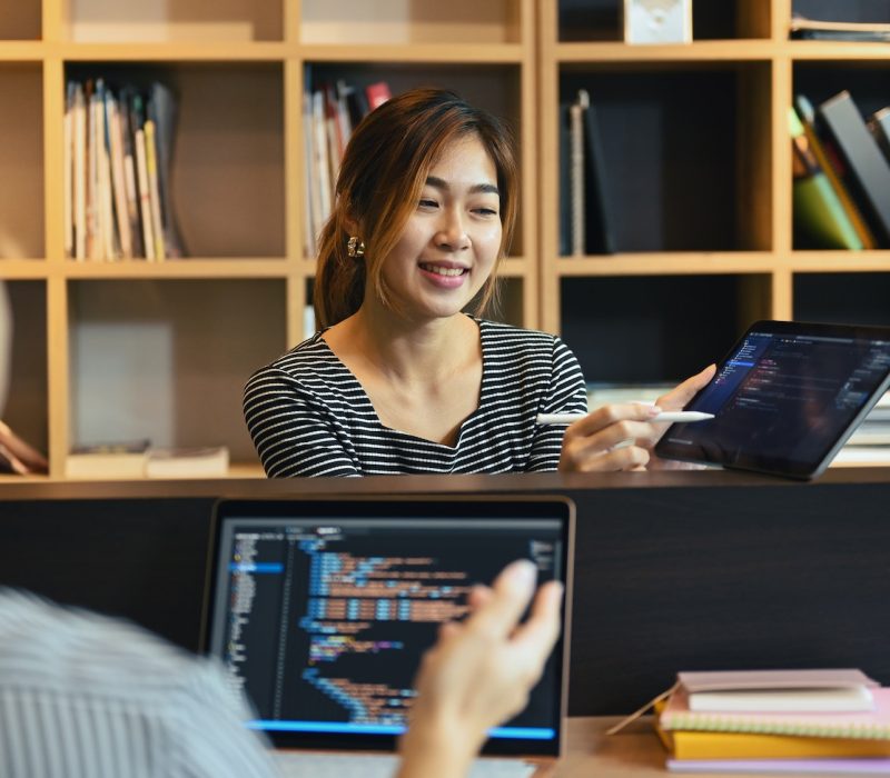 team of professional programmers brainstorming ideas for website interface development .jpg